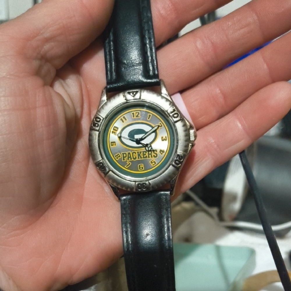 Black and Gold Game Watch with Iconic Logo